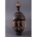 Antike Kpelie-Maske, Senufo 1. Hälfte 20. Jh.Holz geschnitzt, geschwärztes, leicht glänzendes,