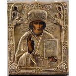 Ikone mit Messingoklad, Russland 19. JahrhundertHeiliger Nicolaus die Bibel haltend. Tempera auf