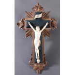 Kruzifix, Frankreich um 1870Corpus Christi aus Elfenbein sowie Memento Mori und INRI-