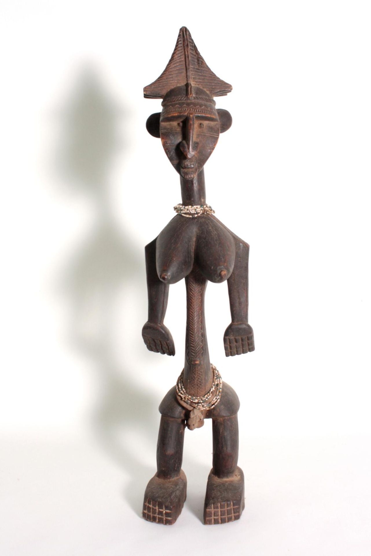 Bambara/Mali, stehende weibliche Figur, 1. Hälfte 20. Jh.Holz, dunkelbraune Patina, stehende Frau