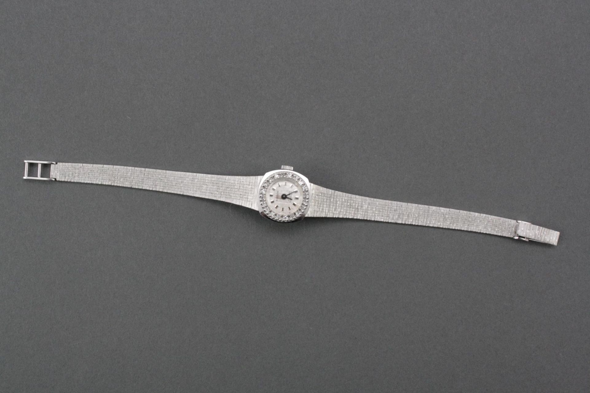 Anker Damenarmbanduhr aus 14 Karat Weißgold und Diamantkranz, Quarz