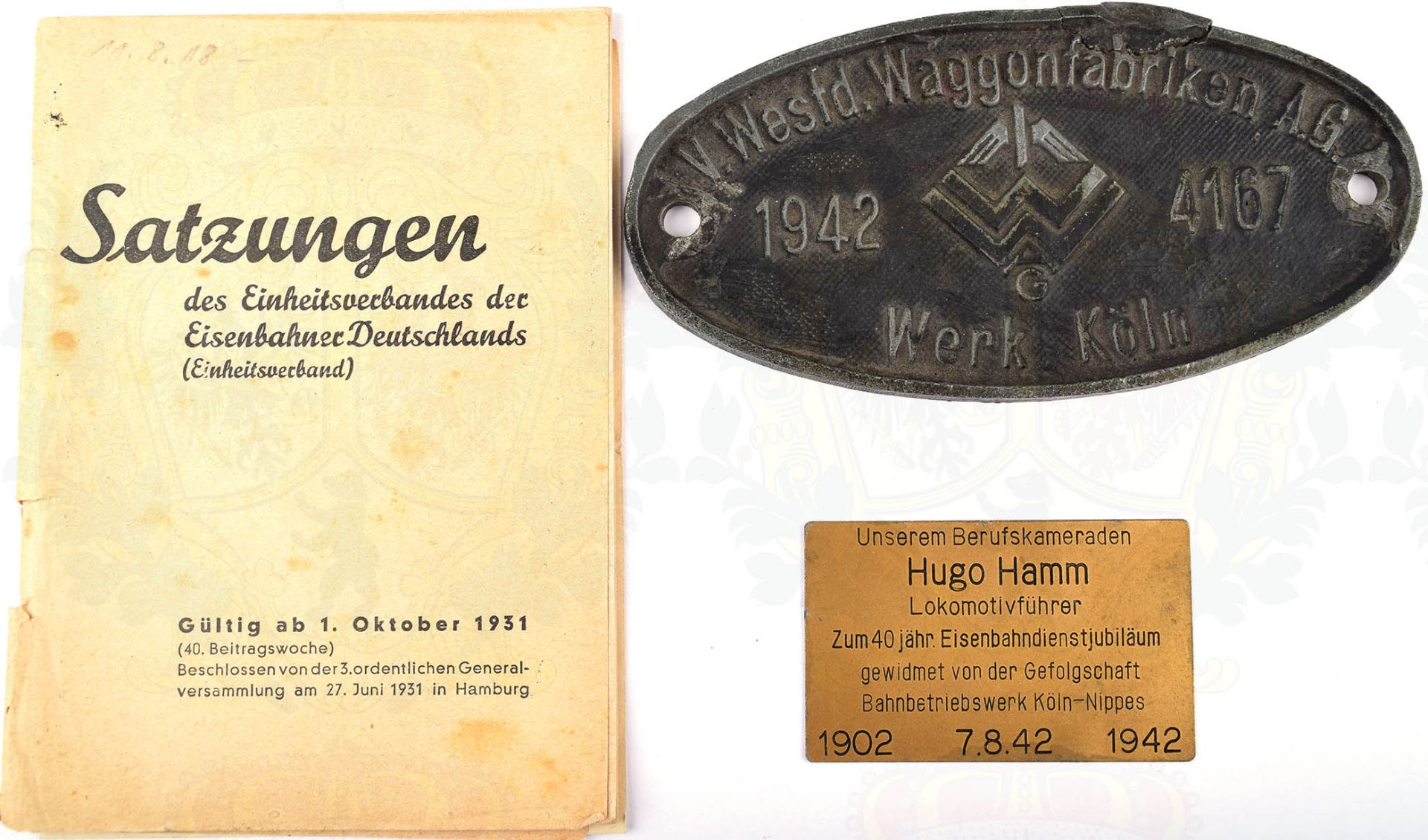 KONVOLUT REICHSBAHN, Waggonschild „V. Westd. Waggonfabriken A.G. 1942 Werk Köln“, Feinzink/pat.,