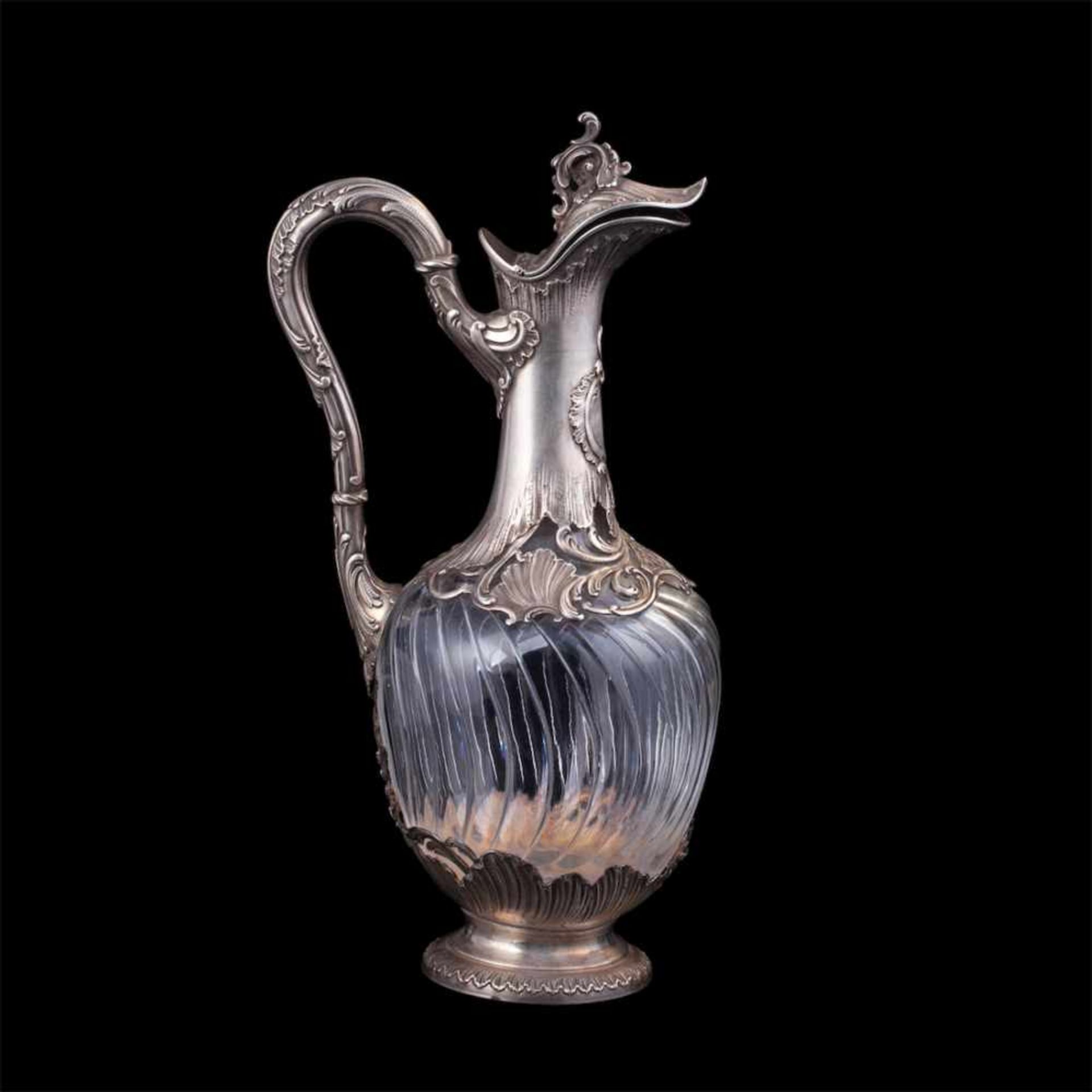 An elegant French silver mounted claret jug