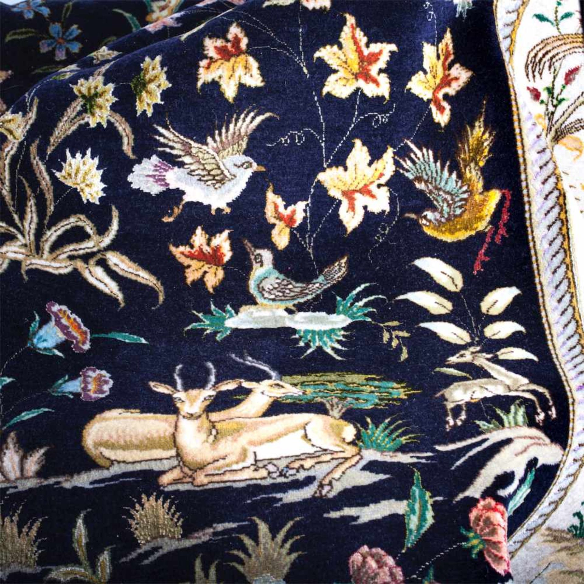 A Persian Tabriz oriental rug (carpet) with animal decoration. On a night blue background are - Bild 5 aus 6