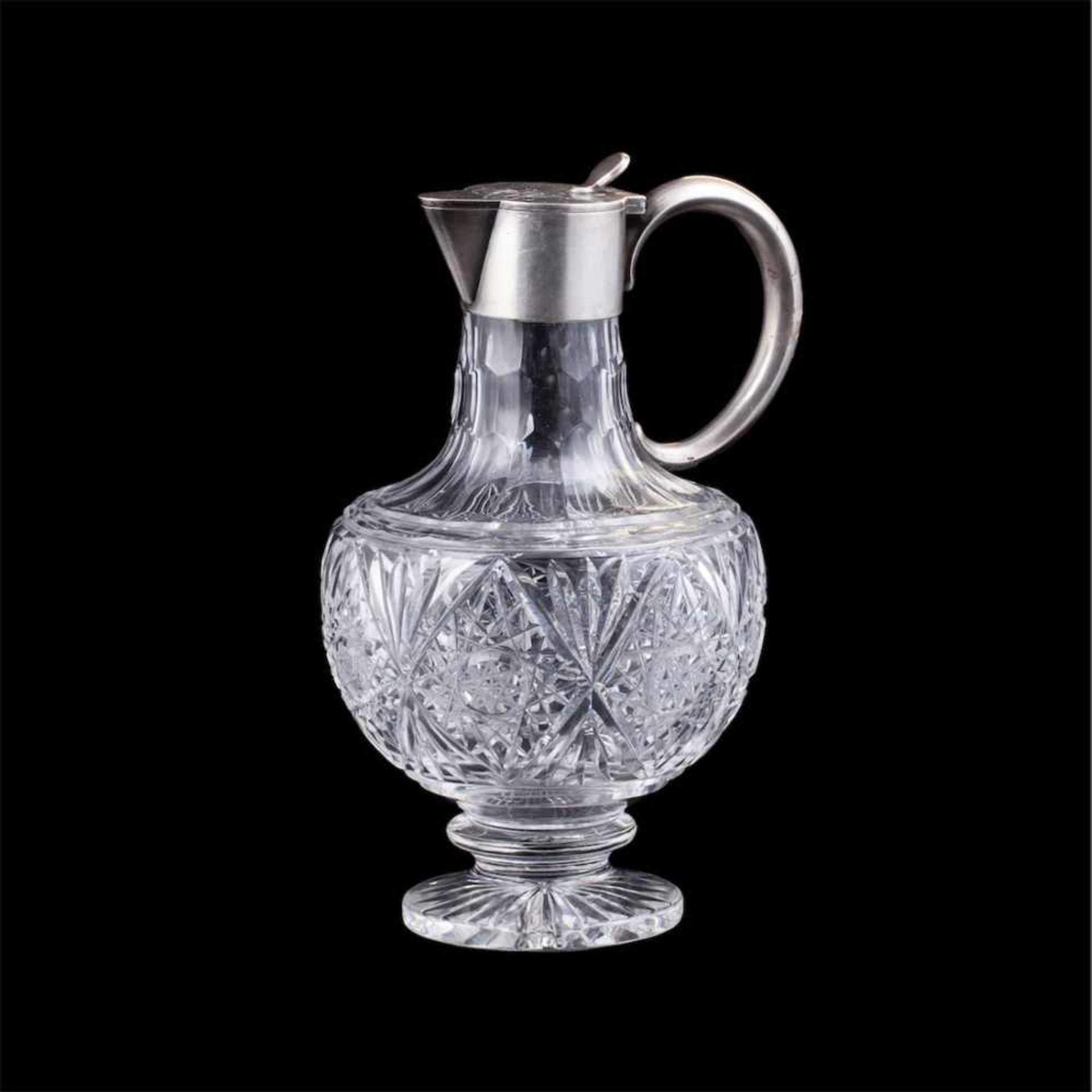 A small Russian silver-gilt and cut-glass carafe