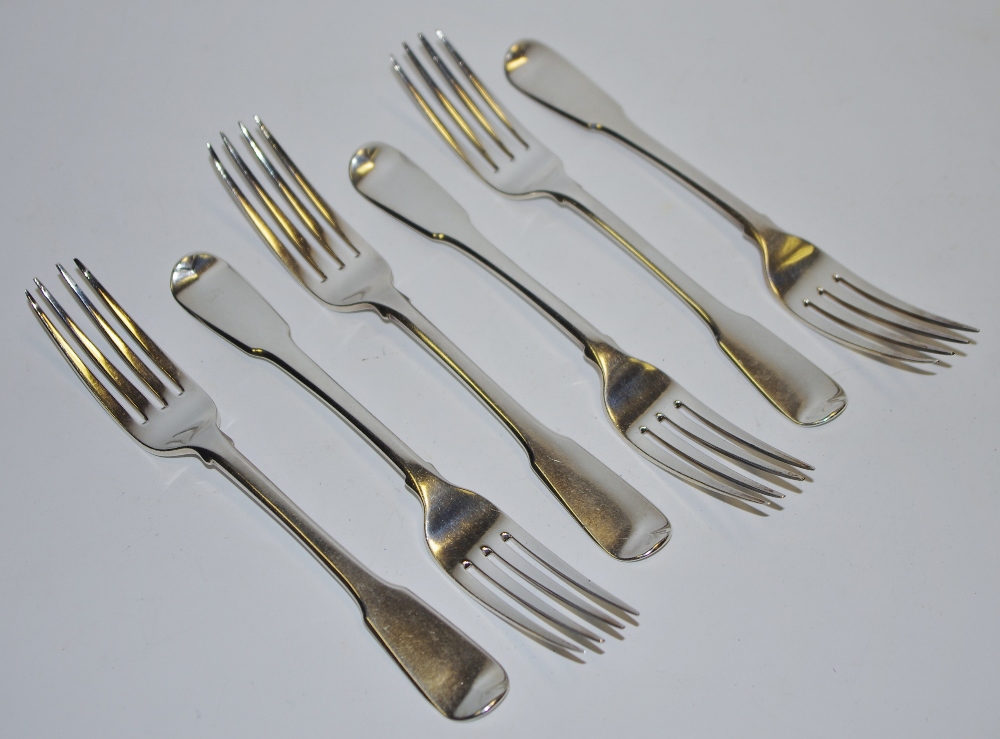 A set of six George III forks by William Ellerby dated 1807 with stag's head erased monogram to