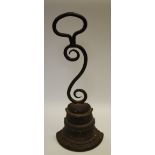 A Regency iron door stop