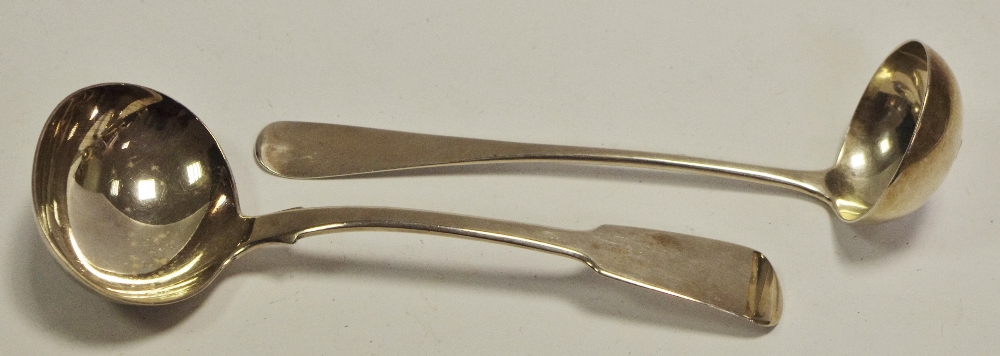 A William IV silver ladle dated 1833;