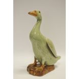 A Chinese celadon glazed goose 26cm high