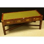 A campaign-type brass mounted mahogany coffee table