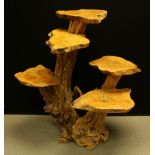 A five tier tree trunk stand
