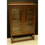 An Art Deco oak glazed bookcase, c.