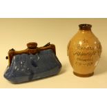 A Bourne Denby stoneware footwarmer, modelled as a Gladstone bag, mottled blue and brown glaze,