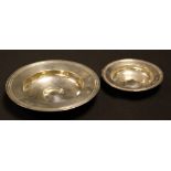 A modern silver dish, contemporary design, oversize hallmarks to rim,