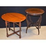 A Victorian mahogany coaching table, c.1880; late Victorian mahogany centre table, c.