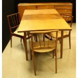 A retro mid-20th century design extending dining table,