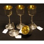 Modern Design - a set of four Elizabeth II silver wine goblets, quite plain, gilt interiors,