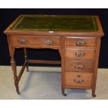 An Edwardian mahogany writing desk, of small proportions,