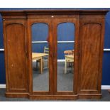 A substantial Victorian mahogany break-centre wardrobe,