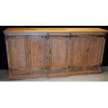 A Country House pine break-centre side cabinet,