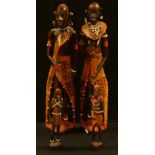 Tribal Art - a pair of carved wooden figures tribesman and woman;