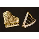 Swarovski Crystal - a pair of Jewelers Collection musical influenced crystal encrusted gold plated