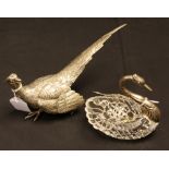 A silver and clear glass dressing table trinket dish as a swan,