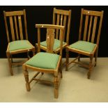 A set of three early 20th century oak dining chairs, turned supports; another,