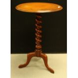 A George III design occasional table, moulded circular top, spirally turned column,