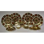 A set of four Royal Crown Derby 1128 pattern plates, 16cm,
