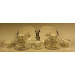 A Shelley Country Garden pattern part tea service, comprising five cups, saucers and side plates,