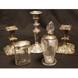 A pair of Edwardian silver boudoir candlesticks, hollow filled, 13cm high, Birmingham 1905,