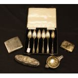 A set of six silver grapefruit spoons,