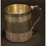 A George III silver tankard, reeded body, London 1811,