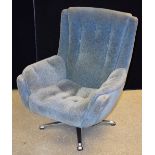 A retro mid-20th century office swivel chair