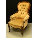 A Victorian mahogany spoon back armchair, c.