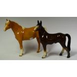 A Beswick model of a palomino horse standing;