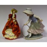 Ceramics - a Royal Doulton figure, Top o' the Hill; a Nao figure,