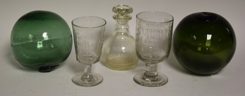 Glassware - a pair of Victorian green fisherman's floats; a commemorative ale glass,