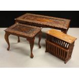 An Indian inspired hardwood coffee table, profusely carved with avians,