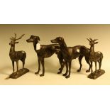 A pair of reproduction cast metal models, as stags, heads raised, 29.