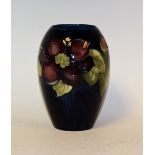 A Moorcroft anenome pattern tapering baluster vase,