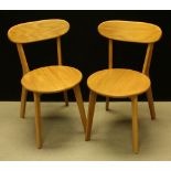 A pair of contemporary ash side chairs (2)