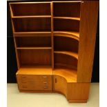 A retro mid 20th century G-Plan bookcase composed of a rectangular open top housing three shelves