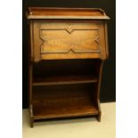 An Edwardian Arts and Crafts style oak bureau,