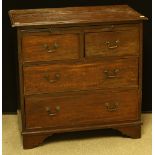 A 19th century mahogany chest, oversailing rectangular top above a slide,
