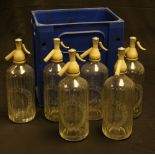 A set of six Schweppes soda syphons,