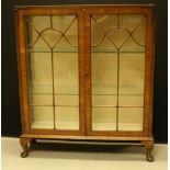 A walnut glazed display cabinet