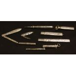 Silver - a 19th century silver cased three section slide action necessaire; others, tooth picks,