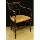 A William IV ebonised open armchair,